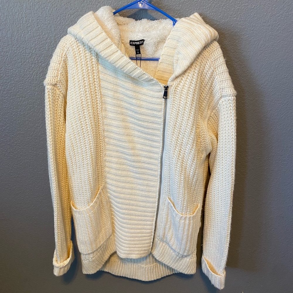 Brand new coat. Creamy color size medium